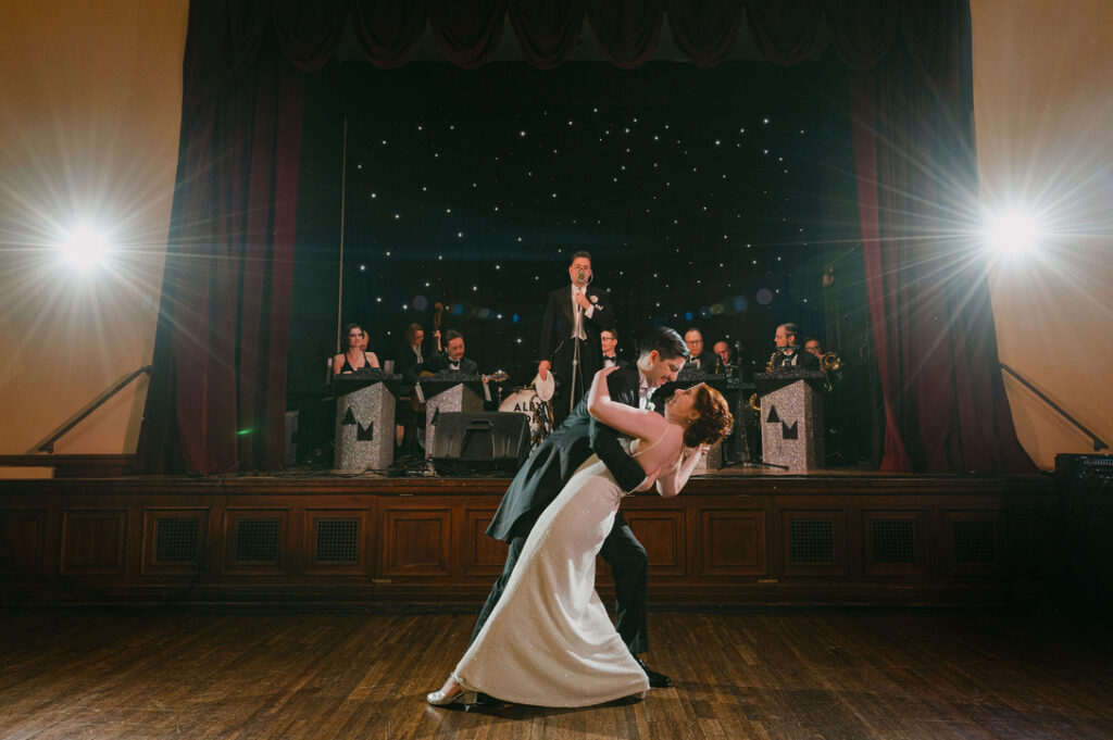 First Dance, big band orchestra playing in ballroom at luxury art deco wedding