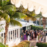 long shot of cocktail hour at la jolla venue La Valencia Hotel