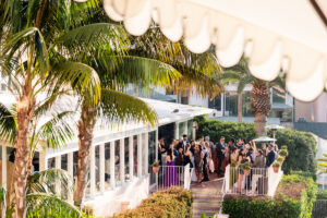 long shot of cocktail hour at la jolla venue La Valencia Hotel